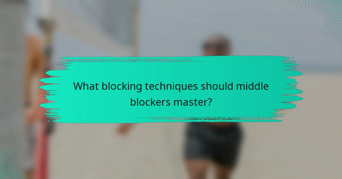 What blocking techniques should middle blockers master?